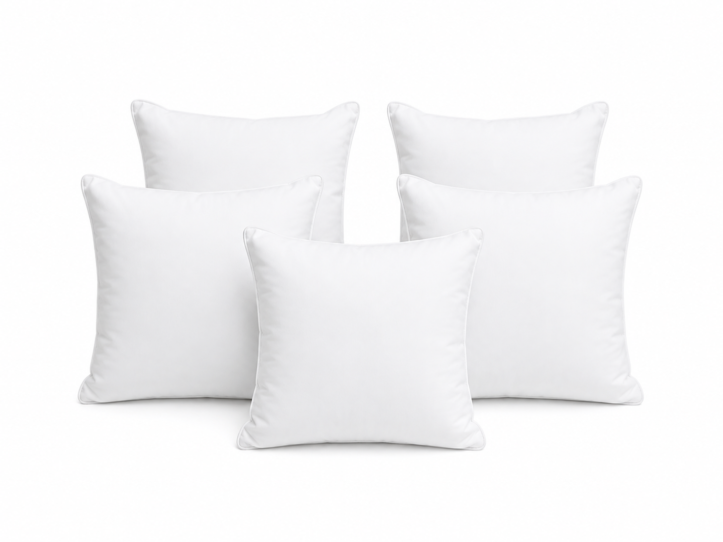 Set of soft white filled cushions
