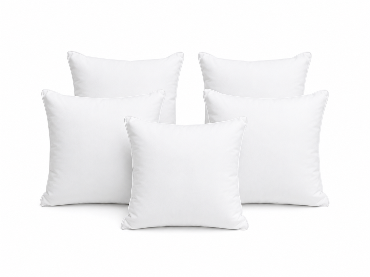 Set of soft white filled cushions
