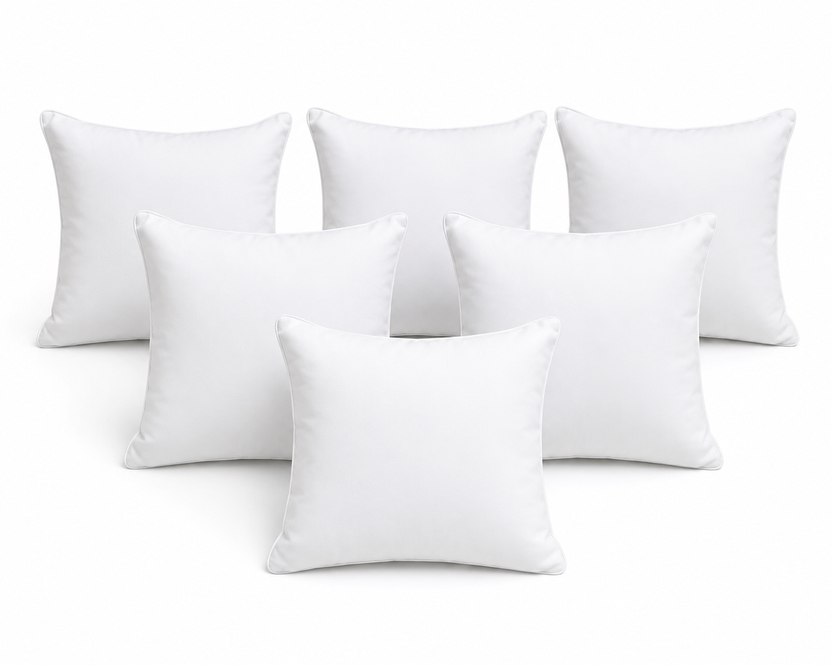Set of soft white filled cushions — 6 pieces